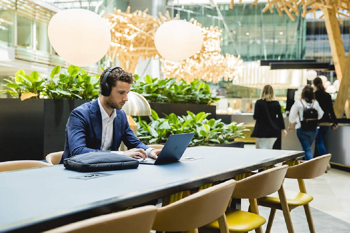 Someone working between the plants in WTC Amsterdam