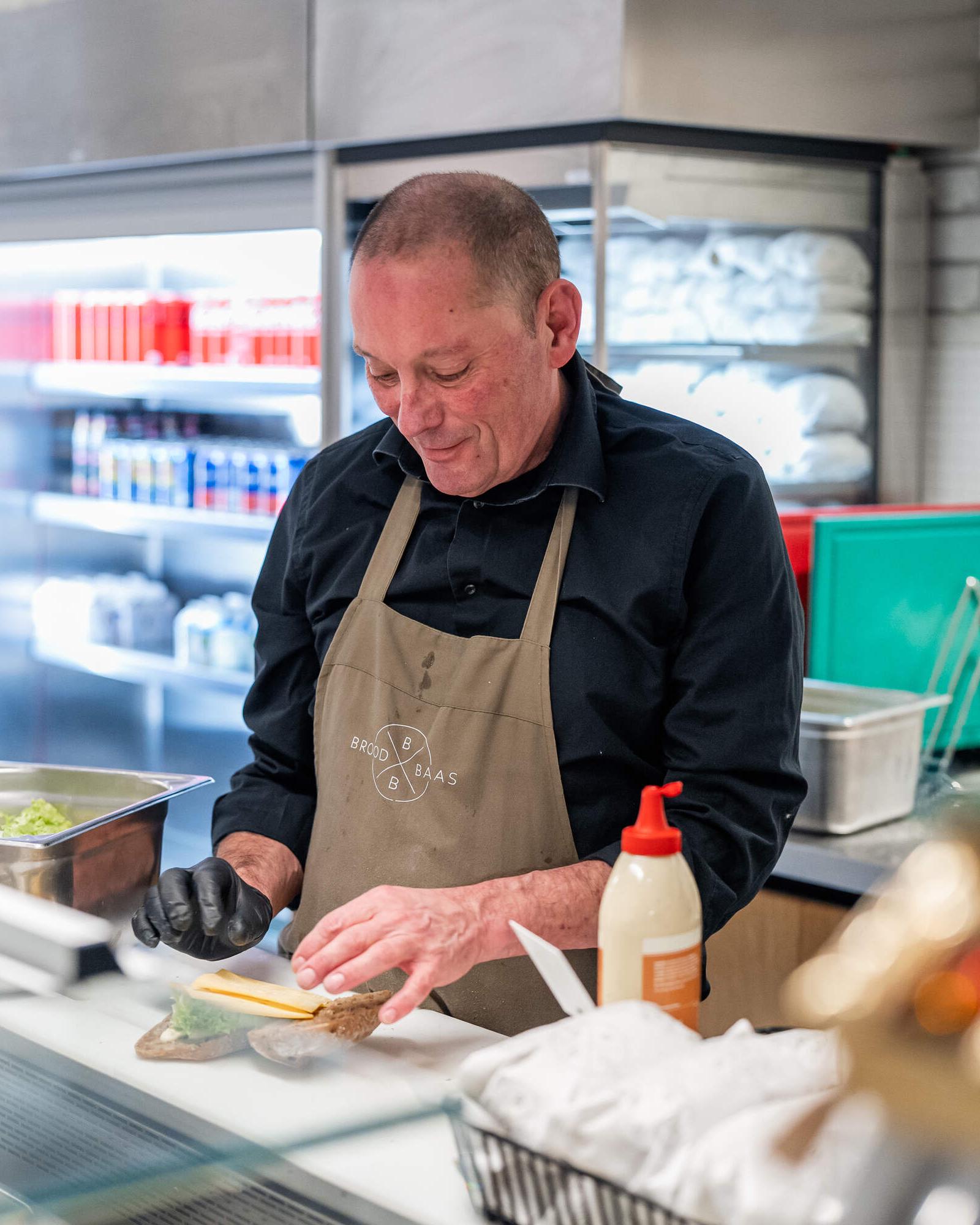 Staff preparing food at one of the cafés in WTC Amsterdam